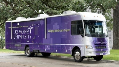 The "Purple People Treater" parked outside Academic Center