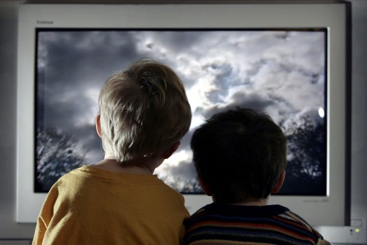 Children Watch Television At Home