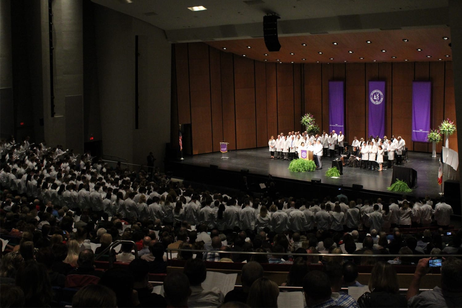 DMU students don their white coats and take the oath at the annual rite of passage.