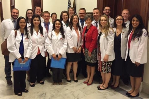 DMU osteopathic medical students with Senator Joni Ernst.